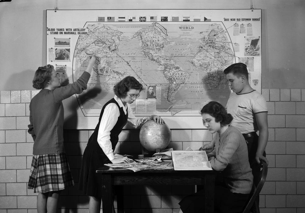 Herman B. Wells with donors of globe in Ballantine Hall